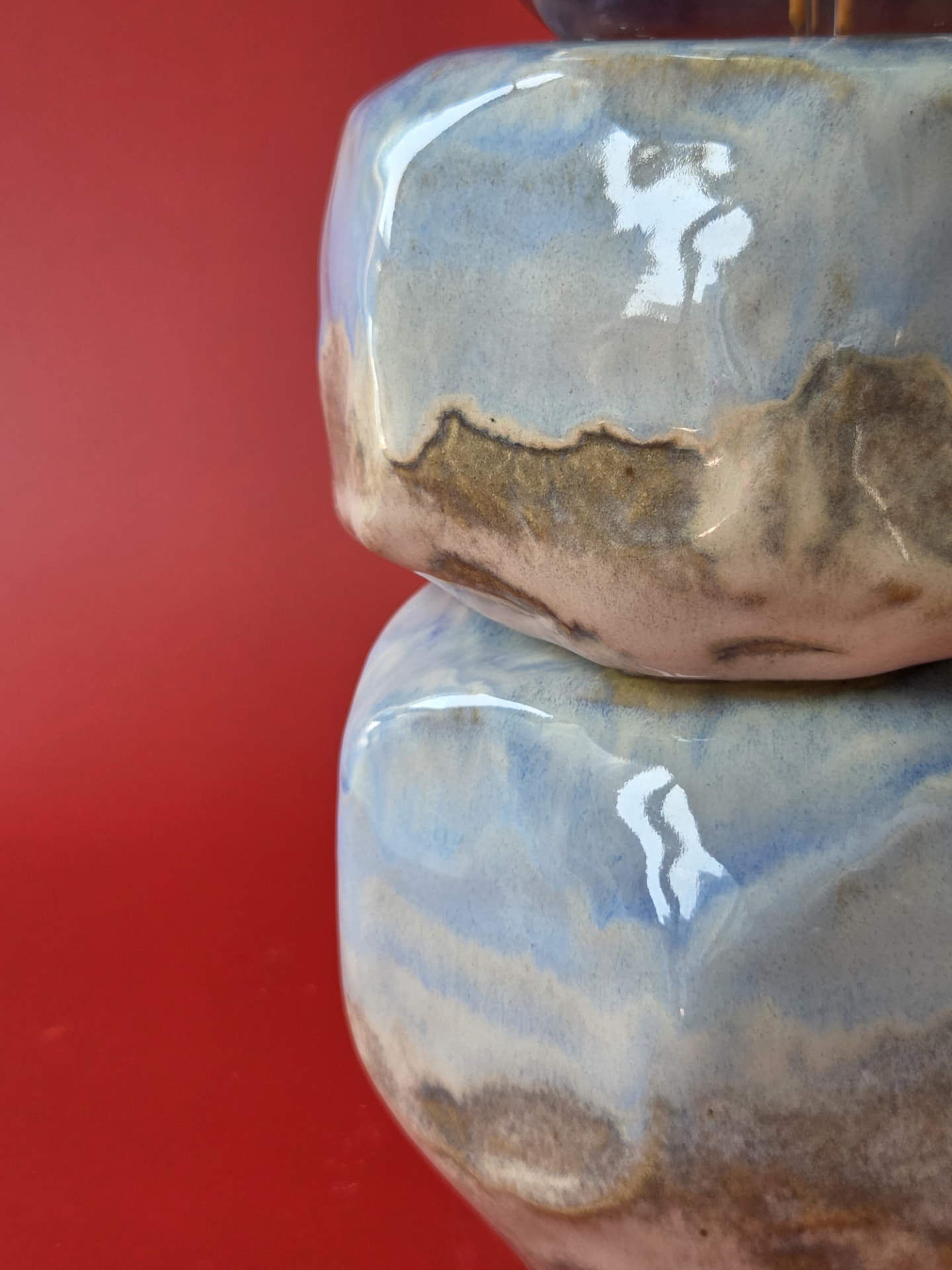 Detail of Cairn's blue, sand and brown glaze