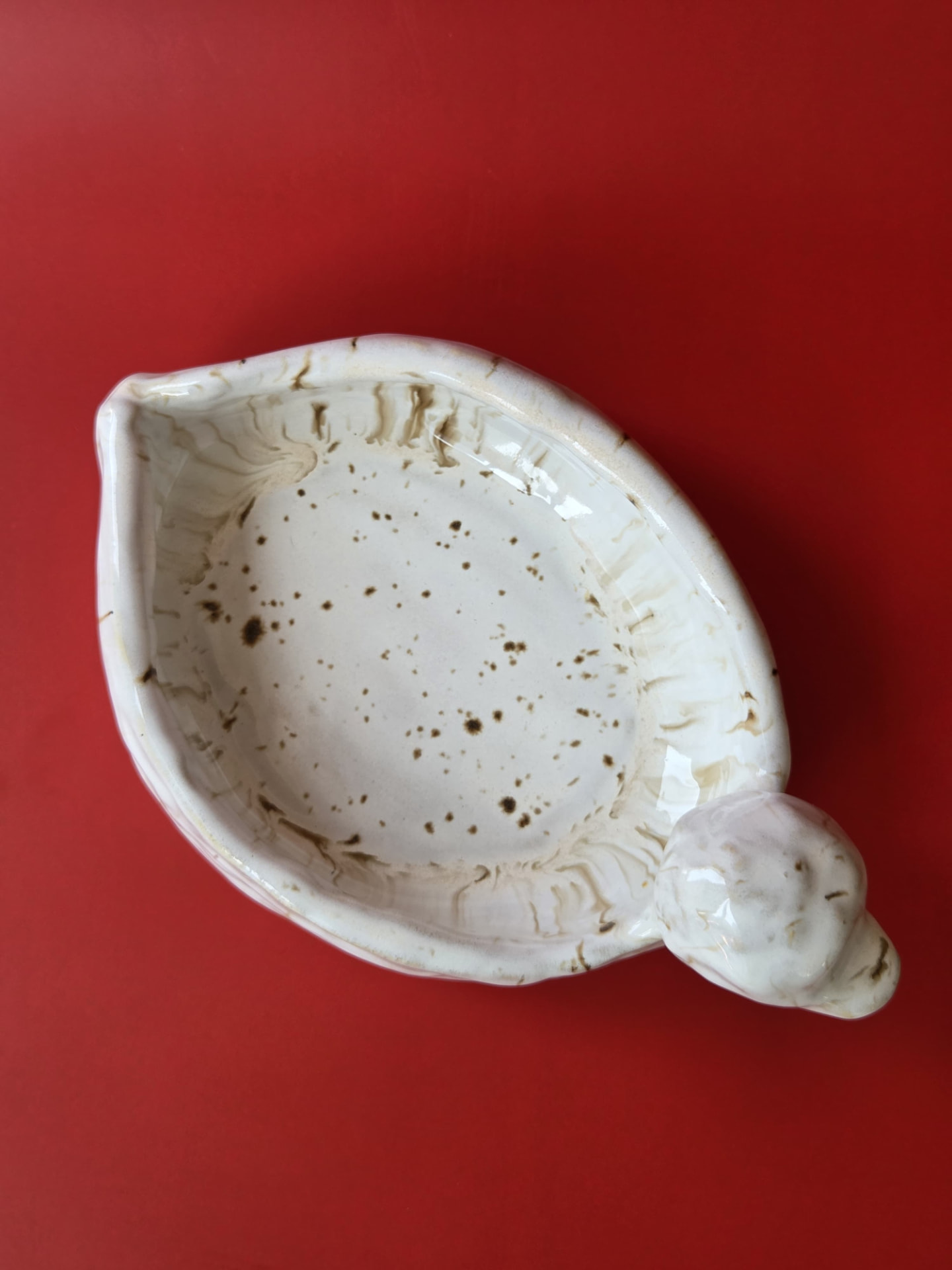 Overhead view of Mooring's leaf-shaped form and sculpted head